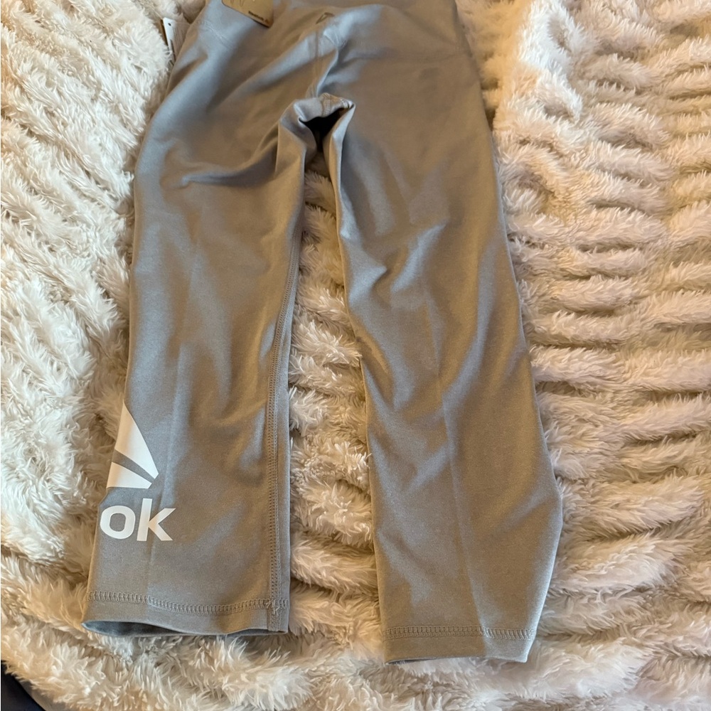 Reebok Women's Capris - Set of 4 1-Mint, 1-Silver, 1-Black and 1 black short. - Picture 7 of 14